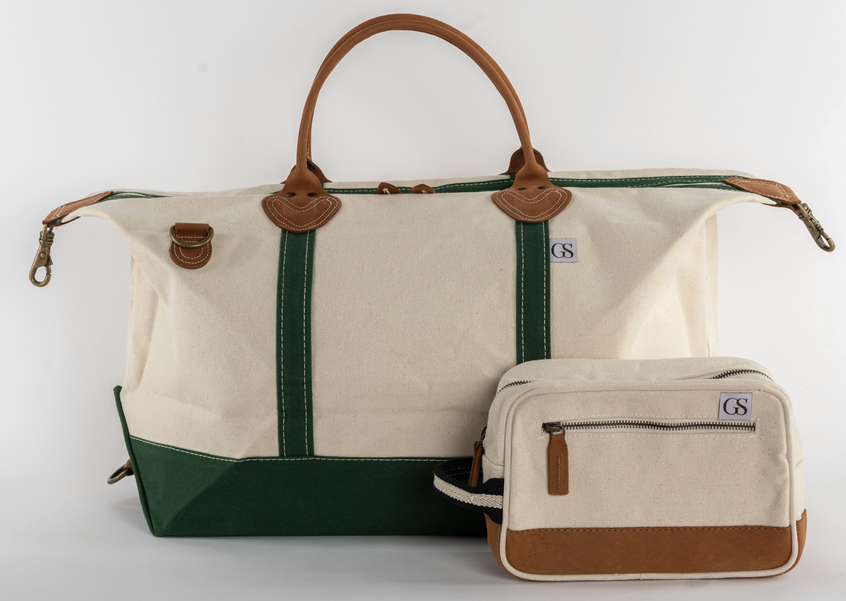 Canvas travel bag with green accents and matching pouch on a white background